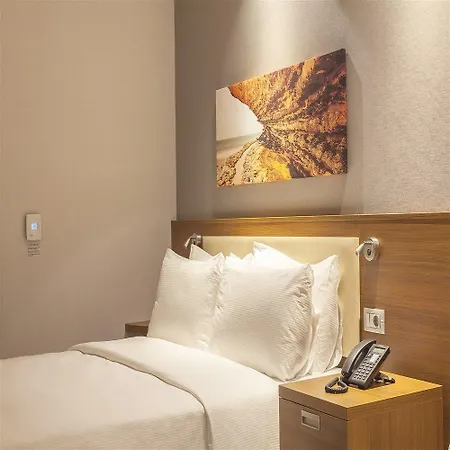 Hotell Hampton By Hilton Symbol